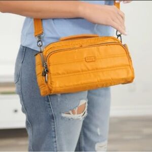 Lug Trolley Crossbody Bag in Yellow